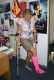 In front of a Robbie Williams Poster